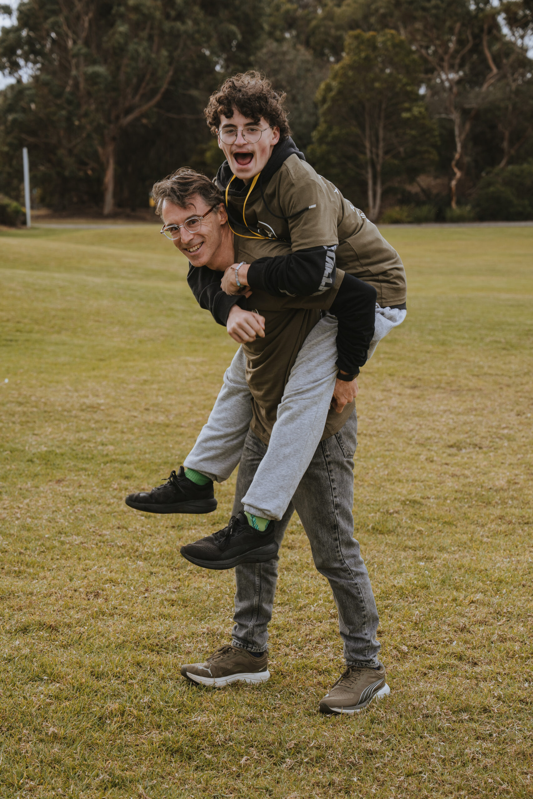 Father and son embrace